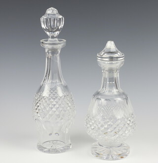 A Waterford Crystal Colleen pattern club shaped glass decanter and stopper 35cm and 1 other 29cm 