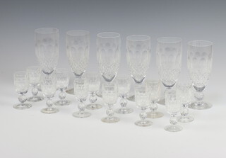 A set of 6 Waterford Crystal Colleen pattern champagne flutes together with 12 ditto liqueurs 