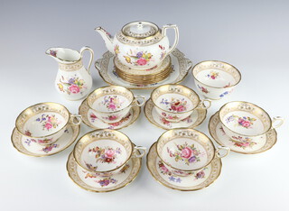 A 23 piece Hammersley & Co tea service comprising twin handled plate, 6 tea plates, teapot, sugar bowl, cream jug, 6 tea cups (1 cracked) and 6 saucers (1 cracked) 