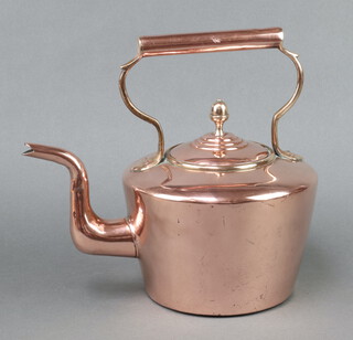 A 19th Century polished copper kettle with acorn finial 28cm x 15cm, the base marked 7