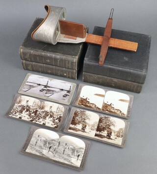 A collection of Underwood and Underwood stereoview slides of Egypt (vols 1 & 2) and Canada (vols 1 and 2) "The Underwood Travel library" contained in faux book casing together with an Underwood and Underwood Stereoscopic viewer 