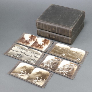 A collection of Underwood and Underwood stereoview slides of Japan ( vols 1 and 2 ) contained in a faux book casing