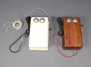 A wall mounted internal telephone contained in a mahogany case 37cm x 20cm x 11cm and 1 other in a white painted case 