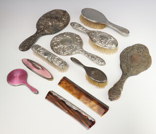 A silver mounted engine turned hairbrush London 1911, 9 other silver mounted dressing table items (mostly a/f)