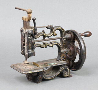 A Victorian manual sewing machine 20cm x 22cm x 9cm 