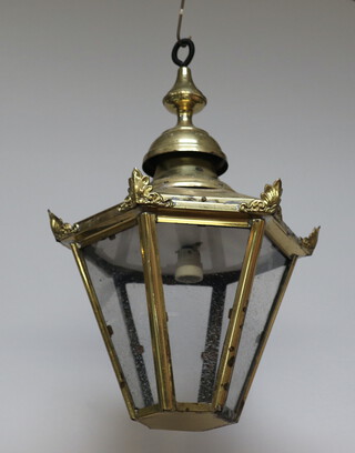 A Georgian style hexagonal hanging lantern in a gilt metal frame 59cm h x 48cm 