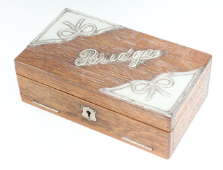 An Edwardian silver mounted oak Bridge box with repousse mounts Birmingham 1904 20cm 