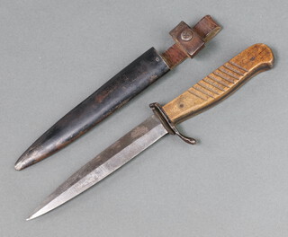 A German First World War trench fighting knife with 14cm blade complete with scabbard 