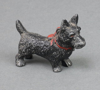 A cast metal figure of a Scottie Dog 5cm x 7cm x 3cm 