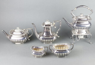 An Edwardian silver plated demi-fluted tea and coffee set comprising tea kettle on stand with burner, teapot, coffee pot, milk jug and sugar bowl