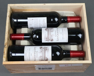 Six bottles of 2015 Chateau Les Gravettes red wine, contained in wooden box 