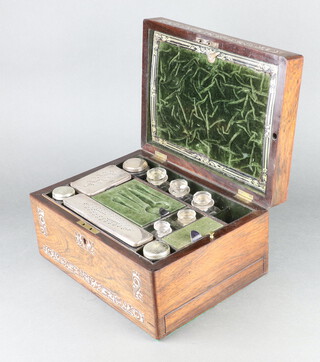 A Victorian mother of pearl inlaid toilet box containing silver plated mounted jars and others with jewellery drawer to base