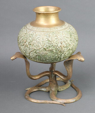 An Indian polished bronze spittoon raised on a separate cobra base 34cm h x 23cm diam.  