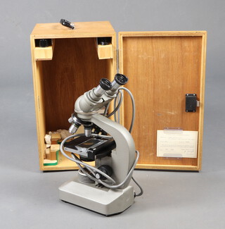 An Olympus Optical Company Ltd binocular electron microscope, serial number 249372 with certificate dated December 1976 