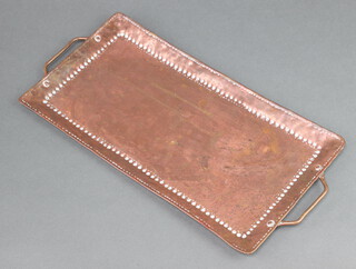 John Pearson, an Art Nouveau planished copper twin handled tray, the base marked JP in 2 places, 40cm x 21cm 