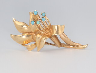 A yellow metal 14k turquoise set floral brooch, 7.8 grams, 45mm 