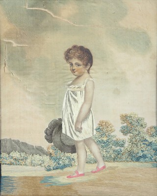 An 18th/19th Century fabric and stumpwork picture of a standing child with hat contained in a decorative gilt frame 25cm x 20cm 
