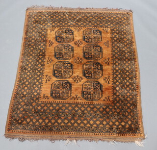 A brown and black ground Afghan rug with multi row border 196cm x 152cm 