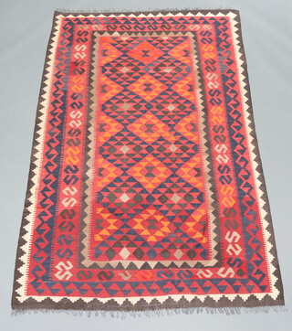 An Afghan Maiman black and white ground Kilim rug 249cm x 159cm 