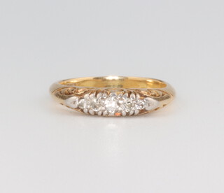 A yellow metal 18ct graduated 5 stone diamond ring approx. 0.15ct, 3.3 grams, size H 1/2