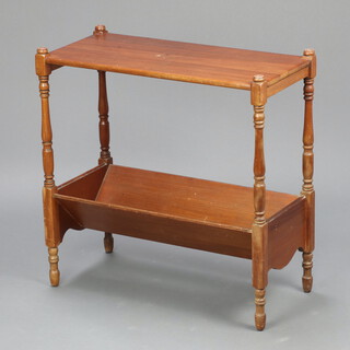 An Edwardian Grand Rapids rectangular mahogany table, the base fitted a book trough, raised on turned supports, labelled to the underside Made in Grand Rapids 67cm h x 66cm w x 30cm d 