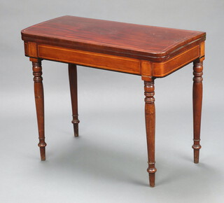 A 19th Century inlaid mahogany D shaped card table, raised on turned supports 73cm h x 89cm w x 38cm d  