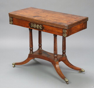 A William IV rectangular inlaid rosewood tea table, raised on 4 spiral turned columns with triform base and splayed feet ending in brass ball casters 74cm h x 91cm w x 44cm d 