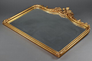 A Victorian style arched plate over mantel mirror contained in a decorative gilt frame 103cm x 124cm 