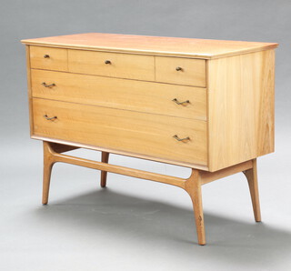 AC, a walnut finished chest of 3 drawers, raised on shaped supports 76cm h x 108cm w x 45cm d 