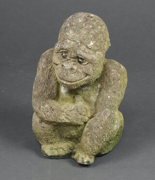 A well weathered figure of a seated gorilla 27cm x 20cm x 11cm 