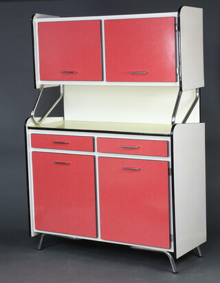 A 1950's style chrome red and yellow formica kitchen cabinet, the upper section fitted cupboards enclosed by panelled doors, the base with 2 long drawers above cupboards enclosed by panelled doors 178cm h x 124cm w x 48cm d 