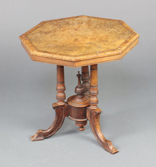 A Victorian crossbanded and figured walnut octagonal occasional table raised on 3 turned columns and outswept supports 52cm h x 52cm w x 53cm d 