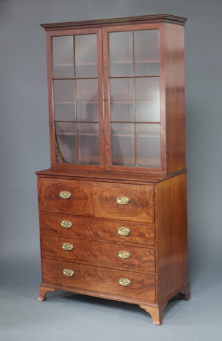 A Georgian mahogany secretaire bookcase with moulded cornice, fitted shelves enclosed by astragal glazed panelled doors, the base fitted a secretaire drawer with pigeon holes and drawers above 3 graduated drawers with replacement oval plate drop handles, raised on bracket feet 226cm h x 109cm w x 57cm d 