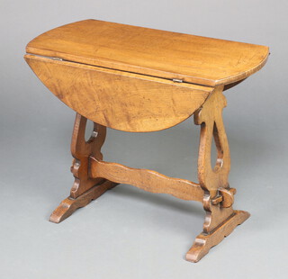 A 17th Century style oval drop flap occasional table raised on pierced standard end supports with H framed stretcher 56cm h x 70cm w x 33cm d 