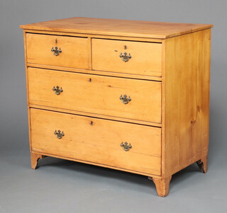 A Victorian pine chest of 2 short and 2 long drawers with brass swan neck drop handles 88cm h x 98cm w x 54cm d 