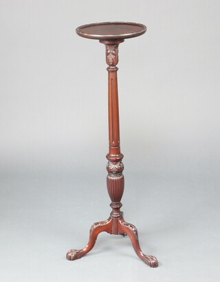 An Edwardian Georgian style turned and fluted mahogany torchere raised on cabriole egg and claw supports 185cm h x 31cm diam. to base 