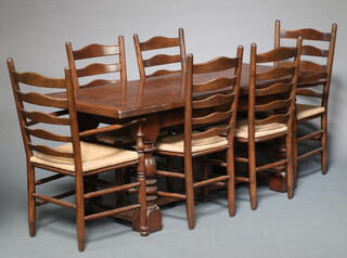 A 17th Century style oak dining suite comprising refectory dining table, the top formed from 3 planks, raised on cup and cover supports with H framed stretcher, 76cm h x 184cm l x 76cm w together with a set of 6 ladder back dining chairs - 2 carvers, 4 standard with woven rush seats  