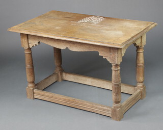 An 18th Century style oak side table, raised on turned supports with box framed stretcher, marked House of Commons Ballot Box C 65cm h x 107cm l x 63cm w 