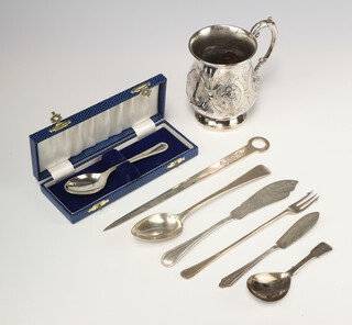 A silver paper knife Sheffield 1977, 6 silver items of cutlery and a plated baluster mug 