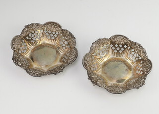 A pair of Edwardian silver bon bon dishes decorated with scrolls and flowers Birmingham 1901 72 grams, 9cm 