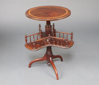 A 19th Century inlaid mahogany sewing table with rotating platform to column, raised on a pillar and tripod base 68cm h x 47cm diam. 