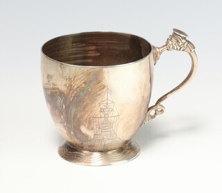 A silver mug with fancy handle and engraved inscription Sheffield 1939, 166 grams, 7cm 