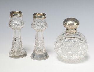 A silver mounted hammered pattern cut glass scent bottle rubbed marks 11cm, a pair of ditto vases 13cm