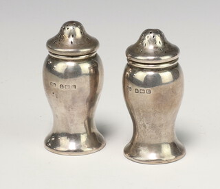 A pair of silver condiments Birmingham 1919 6cm, 36 grams