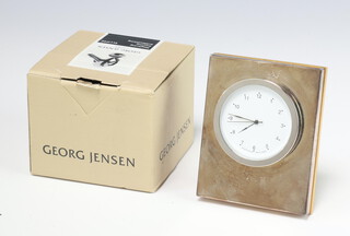 A silver mounted quartz timepiece together with a Georg Jensen keyring (a/f)