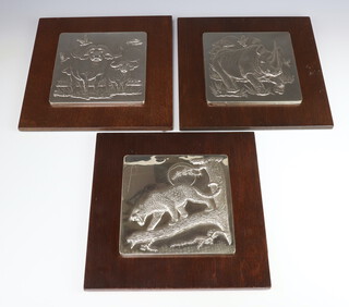 Three Franklin Mint silver filled plaques of a buffalo, leopard and rhinoceros 18cm x 18cm  