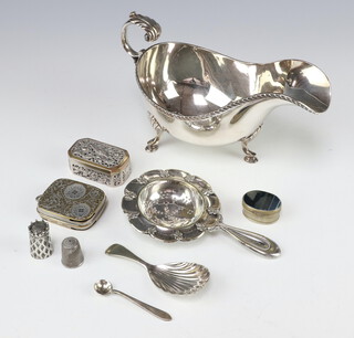 A silver plated sauce boat and minor plated wares 