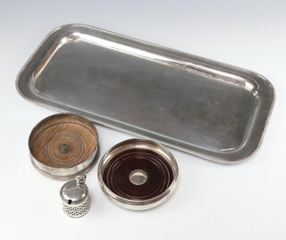 A circular silver mounted wine coaster London 1988, a ditto Birmingham 1990, a silver mustard (rubbed marks) and a plated tray 