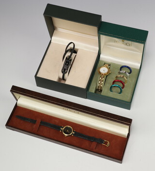 A lady's gilt Gucci quartz wristwatch with interchangeable bezels and 2 other watches 
