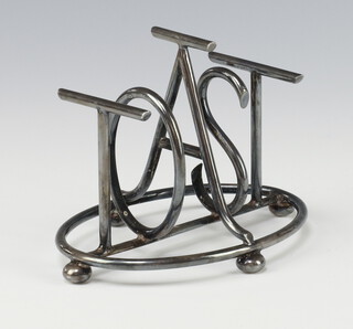 An Art Deco silver plated novelty 5 bar toast rack, the bar spelling TOAST